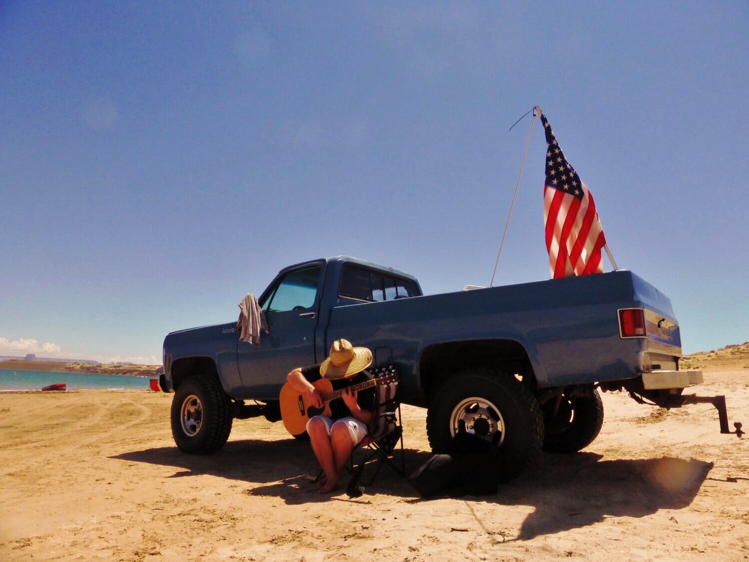 Samuel Davey strumming the blues in the Utah Desert.